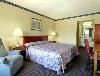 Days Inn North Of Busch Gardens, Tampa — Standard King Bed Room - Designed with your comfort in mind, all of our guest rooms at the Days Inn North of Tampa are freshly renovated and comfortably furnished. Microwave and Refrigerator are available in select room types - ideal for those planning to visit with us for a few days. Need to keep in touch while away from home? All rooms have access to our Free wireless highspeed internet access.