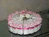 Enchanted Decorating Designs, Tampa — These beautiful cake box centerpiece is decorated with baby roses in pink and white with pink ribbon and pearls attached on the side. In the center we used in addition to the roses, white pearl sprays. These boxes are made of heavy duty card stock and is embossed. They can be filled with any type of candy and given to your guests as favors. It can be made in yellow, blue and pink.