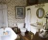 Entire Facility, Glenn Manor, Fennville — The suite also features an in-room private bath with a claw-foot tub/shower and antique dressing table.