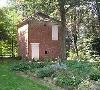 Outdoor Event Area, Wheatland, Lancaster — Built in 1828, the Smokehouse is located a convenient distance from the kitchen. It has three levels to store and cure food: fruits & vegetables were stored at ground level, meats were stored on the top floor, and ice was stored in the basement area.