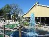 Ace Golf Range & Family Fun Center, Riverview — Open-air Party Barn with picnic tables.