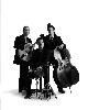 Luxury Trio, Houston — Old-school jazz trio that plays instrumental versions of the classics by Ellington, Sinatra and Jobim as well as jazzed-up versions of Elvis the Beatles and current pop tunes. Performers play arch-top guitar, upright bass and drums. Perfect for upscale events including weddings, and corporate parties.
