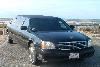 Limousine Services of Cape Cod, Brewster — We are a limousine company that focuses on our clients by providing a V.I.P. service.  Our service is of top quality, while keeping in mind the little details that help to make their ride enjoyable. Bite size snacks. Tic tacs. 8 Ounce serving size of bottle water, soda or juice on ice. Fine white tulle with small silk flowers that gives an added touch for weddings. The white carpet for weddings and the red carpet for the celebrity style. Opening the doors to holding the umbrella when needed. We offer a pearl white Cadillac Sedan, black 6 passenger Cadillac limouisne, and a black Lincoln Navigator SUV.