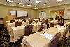 Hampton Inn & Suites Herndon/Reston, Herndon — Executive meeting room features complimentary High Speed Internet, built in screen, projector, cable package for laptops and built in white board with markers.  Meeting room is 575 sq feet and has windows for natural lighting.