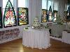 The Jack Robinson Gallery, Memphis — A wedding cake in the Ballroom by the mirror wall.