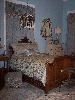 Aavakian - Shadowlawn Bed & Breakfast, Columbus — The Double French Suite is a spacious 19 x 20 room with 14 foot ceilings and is decorated in Napoleon Blue with French Antiques with French Florentine accents. It includes two Double Beds with a single mirrored door Armoire.

     This upstairs bedroom has a Full-sized Desk with Wi-Fi Internet Access, 23” Television with cable, 3-speed Ceiling Fan, and bedside alarm clock. This room has its own Private Bath.