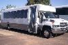 Marveless Transportation, LLC, Phoenix — Mini Coach - Mini coach accommodates 22-33 passengers. Used for long trips or shuttle service. Comfortable mid back cloth seats, Duel HD A/C, AM/FM radio, CD/DVD player, 20" TV in front, 15" Pop-down TV in the rear, and public address system. Tinted Windows, Separate rear luggage compartment.