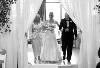 Photomasters Photography, Fort Lauderdale — We Can not explain it!  This photo Is one our Favorites.  The Black and White really showcases a time freeze on this moment!
The moment when their little girl walks down the isle for marriage and "Sails off Towards the Sunse". Here we go, they must be thinking.! The brides dream also is now, true and alive and happening, at the beginning of the walk down the isle where at the end ,...everything changes...