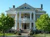 Cartier Mansion B & B, Ludington — Experience the historic elegance of Cartier Mansion.  Built in 1905 this neoclassical mansion is furnished with exquisite woodwork and antiques.  Walk to Lake Michigan beaches, restaurants, shops, marinas, and car-ferry.  Spacious common areas, wireless internet, 300 plus thread count sheets, down comforters and chocolates make your stay a memorable experience.