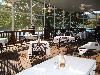 River Inn Events Center, Chattanooga — The upper deck is screened and covered which is ideal for outside festivities.  This deck can accommodate 115 for a sit down diner.