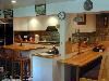 China Doll Guest House, Chicago — China Doll III Kitchen and Eating Area