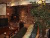 China Doll Guest House, Chicago — China Doll III Living Room with Fire Place