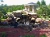 Castle of Paradise, Castle of Paradise, Griffin — Rock fountain and koi pond