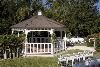 Garden & Gazebo, Best Western Lake Buena Vista Resort Hotel, Orlando — Due to the popularity of weddings the hotel has added a lush garden crisp white gazebo where up to 100 of your guests will have a perfect view of your magical moment taking place.