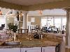 The Indian House, Resort Pointe, Fenwick Island — The spacious, ultra-modern kitchen includes two refrigerators and a complete array of cookware and countertop appliances.