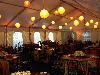 Camelot Special Events & Tents, Inc., Wakefield — The frame tent shown in this photo is really a Structure.  It stands up really well in windy areas and can take a snow load.  The frame lends itself to multiple hang points for lighting and decor.

The 30x50 size shown here was linked to the garage which was the catering prep area, and up the stairs to the deck and then the house for guest access.