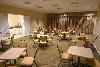 Cortona Inn & Suites Anaheim Resort, Anaheim — Breakfast Room - Complimentary Deluxe Continental Breakfast served daily.