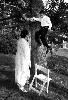 Dennis Drenner Photographs, Baltimore — boy at wedding in trouble after climbing tree