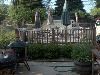 Garden, Among Friends, Family and Company, Evergreen Park — The sturdy wood deck provides the perfect setting for the bride and groom's wedding ceremony, arbor, flowers, etc.