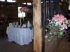 Stable, Cross Creek Ranch, Dover — Bridal Party Look at Coffee Table.