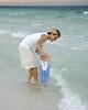 Photocraft By Tom Warriner, Destin — This baby was seeing the Gulf of Mexico for the first time. Mother and child enjoyed the beach in Destin, Florida.