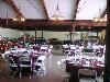 Museum Rental Space, Sarasota Classic Car Museum, Sarasota — Party set up in our museum amongst our classic car display.  Note the vaulted ceiling, chandeliers and wooden beams!  This space can be dressed up for a black tie affair or a redneck ball!  Everyone has fun here!