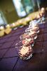 All Occasion Celebrations, Simpsonville — Place card display with votive accents on pintuck linens.