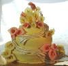 Art Eats Bakery, Greenville — Yellow fondant wedding cake with white chocolate calla lillies