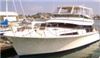 Hululani Yacht, Corporate Image Yacht Charters, San Diego — Experience the yachting lifestyle onboard the 50 foot yacht Hululani, with overnight accommodations for up to 6 passengers and day trips for up to 12 passengers. The yacht has two berths/state rooms with a queen bed in the master and a double with a single bunk above in the second room, perfect for a romantic weekend getaway or private business meeting. The galley includes a large refrigerator and microwave stove with seated dining for eight. Also provided are two ice makers, bar and a high definition DVD player with screen to watch your favorite movies when you’re not fishing or outside on the deck enjoying the sea breeze.
