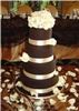 Triple C Cakery, Barrie — Chocolate Elegance!  Four lucious tiers of vanilla caramel cake, iced with caramel swiss meringue buttercream, covered with the best quality chocolate fondant.