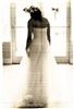 Bliss Photography LLC, Greenville — bride walking into light in old fashin photo finish
