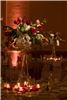 Cheryl's Distinctive Creations, Orlando — Elegant centerpieces of Hydrangea, Orchids, Viburnum and French Tulips surrounded by Rose petals and votives.