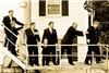Fischer Williams Photographic Studios, Cross River — The Groomsman and Groom on Fire Escape
