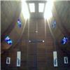 Ascension Lutheran Church, Columbus — Beautiful Stained glass accents this traditional worship center. Grand arched ceilings with skylights and stained glass. Padded wooden pews. Custom built German handcrafted pipe organ.