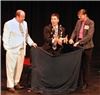 Amazement Productions, Olympia — The City of Olympia called on Jeff Evans to perform as part of the City's 150th Anniversary celebration at the Washington Center for the Performing Arts.  Here City Councilmembers Joe Hyer and Karen Messmer assist with Jeff's comedy escape stunt.