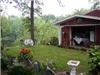 Alda's Magnolia Hill, Little Rock — guesthouse and outdoor kitchen overlooks the lake