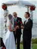 Officiant James W. Rury - San Diego, San Diego — Exchange of roses between couple, then to mothers.