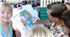 Caricature Party Artist, Suffern — Herman draws girl on tee shirt at party
