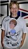 Caricature Party Artist, Suffern — boy models his tee shirt with caricature at party