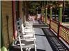Entertainment area, Ashley Rose Victorian Inn, Cape May — The front section of the wrap around porch.