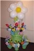 Balloon Extravaganzas Certified Master Balloon Artist Daryl Baldwin, Saratoga Springs — 6' tall floral display with surrounding centerpieces.