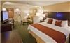 Best Western Ambassador Suites, Venice — King Suite with sleeper sofa in sitting area. Kitchenette with refrigerator, microwave, coffee make and Flat screen Television.