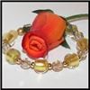 Ruby Leif Accessories LLC, Sussex — Swarovski crystals, gold foil-lined glass, rolled gold, yellow jade, carnelian, freshwater pearl - "Golden Love", one-of-a-kind.
