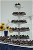 Kickass Cupcakes, Boston — Six tier towers hold up to 80 cupcakes and are available for rental.