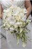 Artistry in Bloom Floral Design Studio, Victoria — Bridal bouquet of freesia,calla lilies, roses, dendrobium orchids, and preserved gardenias.
