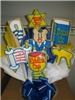Cookies by Design - New York, New York — Send your wishes of “Mazeltov!” to the Bar Mitzvah boy with this colorful cookie bouquet filled with cookies shaped like a torah, prayer book, stars of David, and more. Use as centerpiece or individually as favors for your event.