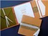 Deborah Nadel Design, Merrick — Indian wedding invitation, 3 panels with pocket and ribbon closure