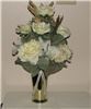Enchanted Decorating Designs, Tampa — This elegant wedding arrangement is 21"H x 11"W. It can be used as your alter or wedding centerpiece. This affordable centerpiece sits in a 7" gold or silver trumpet vase which is included in the price. It consists of 8 open roses, 2 bunches of hydrangeas, an array of berries, 3 wisterias, 3 feathered picks, baby's breath, greenery and ivory ribbon.