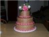 Kreations by Krystal, Dayton — Maries wedding cake.Vanilla cake with whipped french vanilla filling and chocolate buttercream.Vanilla buttercream pearls in fuschia and baby pink.Flower bouquet topper.