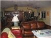 Casa Encantada, Casa Encantada, Palmetto — The cook's kitchen opens to a large, comfortable den.